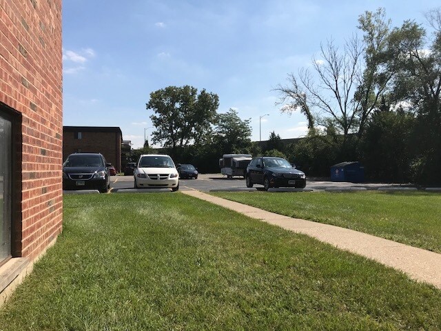 A Partial Parking Lot Photo - 731 Old Grand Ave