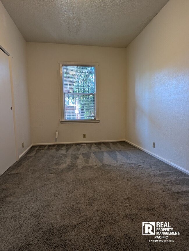 Building Photo - Charming 2BR Home with Private Deck & Shared Backyard – Oakland