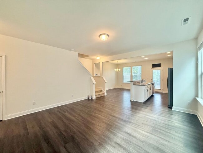 Building Photo - Spacious 3BD, 2.5BA End Unit Raleigh Townhome Near White Oak Shopping Center, I-40, and Downtown ...