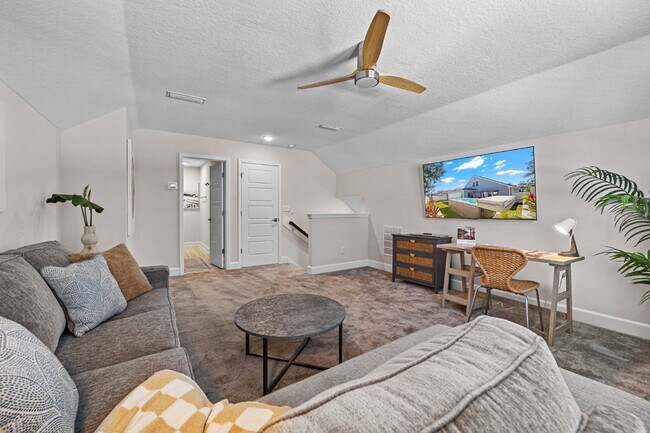 Building Photo - "Luxurious Furnished Home with 4-Bed, 3-Bath, Swim Spa Fenced Yard Golf Cart steps to the beach!"