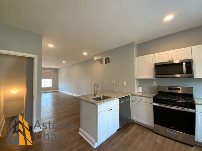 Building Photo - End Unit 3 Bedroom + Den with Backyard and Semi Finished Basement