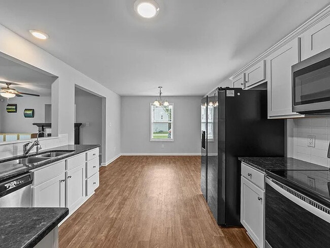 Building Photo - Earn Wealth While Leasing - Like a Homeown...