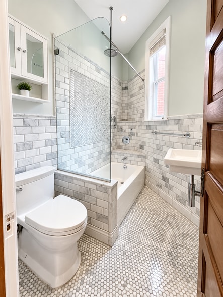 2nd floor hallway bathroom with subway tile, tub and glass enclosed shower - 2322 1st St NW
