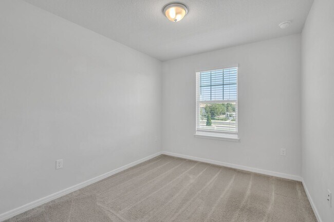 Building Photo - Luxurious Townhome in Lake Nona - A Perfec...