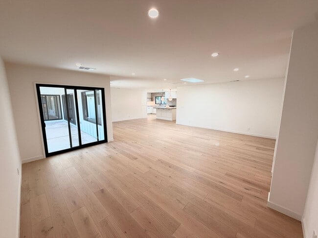 Building Photo - This premier 4-bed, 3-bath estate spans 2,565 sq. ft. on a 10,253 sq. ft. lot in North Los Altos.