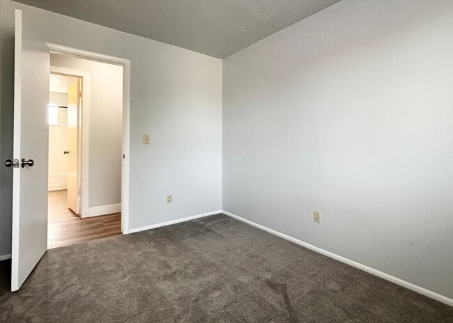Building Photo - Cozy Home with New Paint & Flooring!