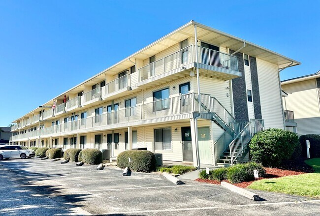 Building Photo - Nice 1 bedroom condo for rent in Miramar Beach w/ a community pool!