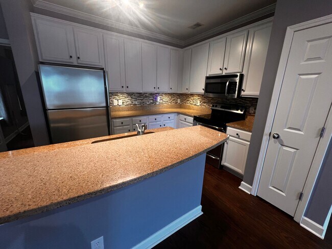 Building Photo - Now Available! Luxury three-bedroom townhome in St. James Square in Myrtle Beach.
