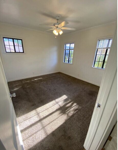 Large Bedroom fits a king sized bed and overlooks the front yard. - 1733 Phillips Way
