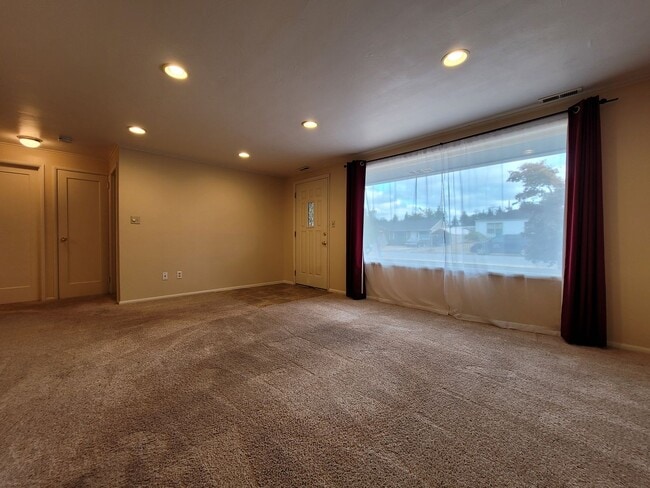 Building Photo - Bright Four-Bedroom Home with Spacious Outdoor Area