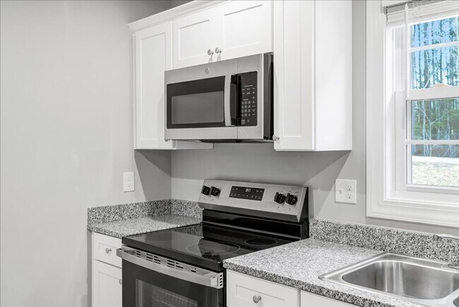 Building Photo - New Construction 3 Bedroom/ 2 Bathroom Homes with Garage