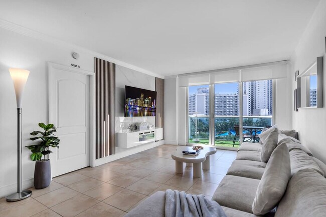 Building Photo - 19370 Collins Ave