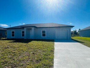 Building Photo - BRAND NEW 3/2/1 SINGLE FAMILY HOME--SW LEHIGH ACRES