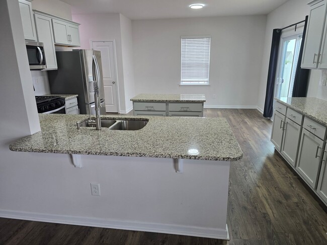 Building Photo - Corner Lot Rental Home with 4BR/2.5BA, Ful...