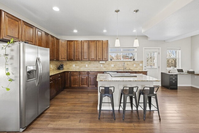 Building Photo - Spacious Home with Finished Basement, Granite Kitchen & Fenced Yard Near Fort Carson