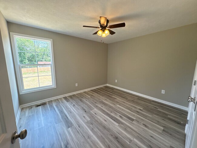 Building Photo - Charming New Home with a Rocking Chair Front Porch!