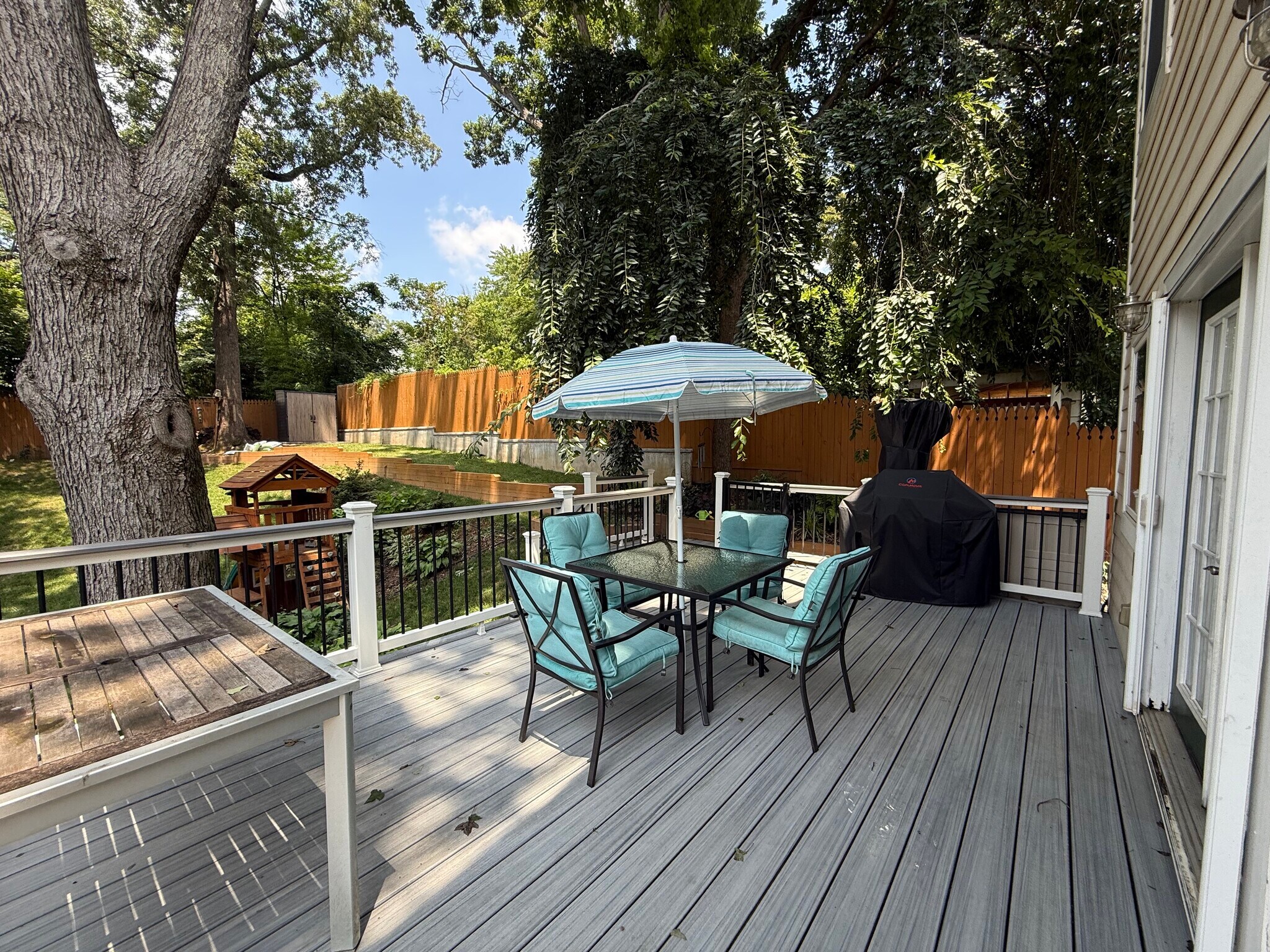 Shaded back deck with Trex decking - 5715 7th St N