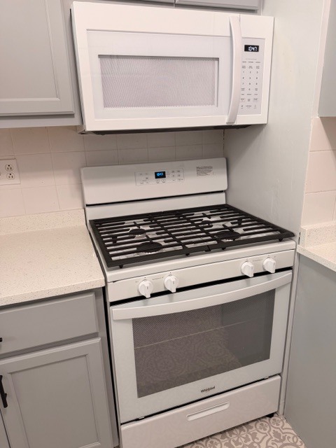 New Range - 6158 W Grand Ave