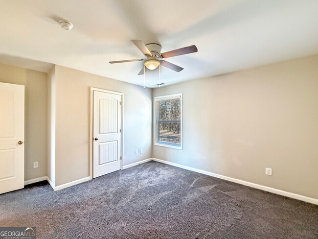 Building Photo - 6369 Woodland Station Dr