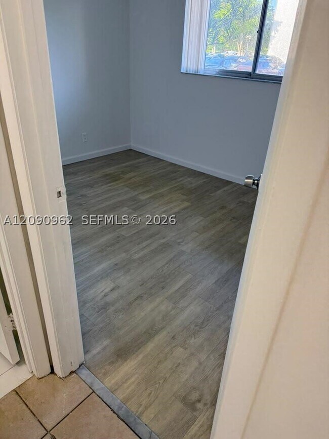 Building Photo - 8740 N Sherman Cir
