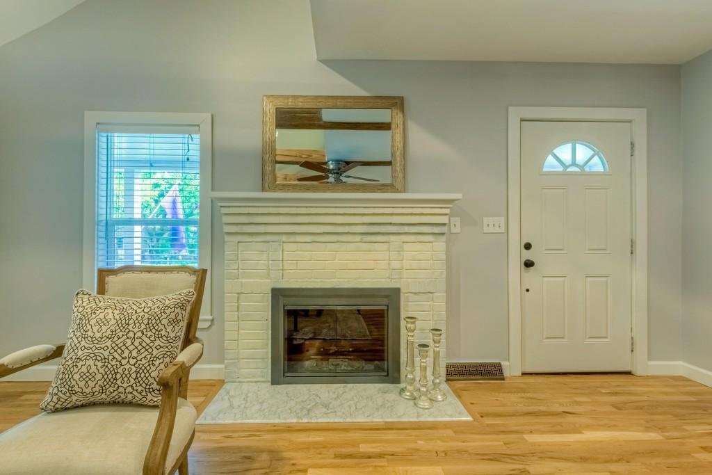 View of front door and fireplace - 408 Woodland Shores Rd
