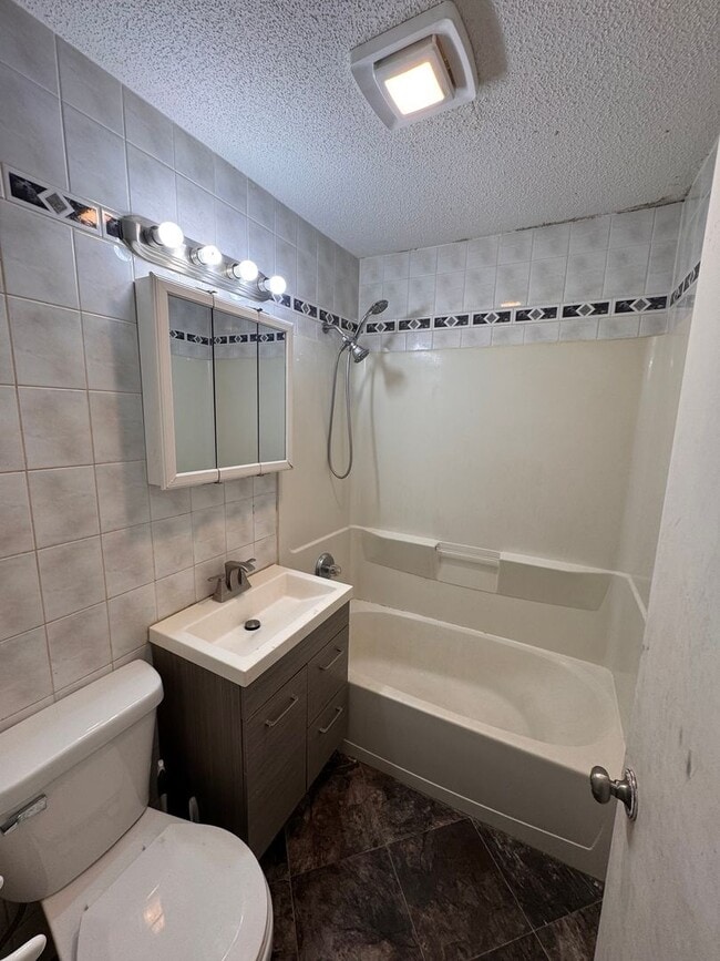 Building Photo - AVAILABLE NOW - Nicely rehabbed 3 Bedroom Single Family Home with Garage and Very Large Backyard