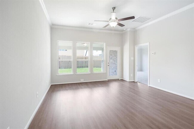 Building Photo - AVAILABLE NOW! This  3 bedroom, 2.5 bath, 1.5 story home is located in the convenient location of...