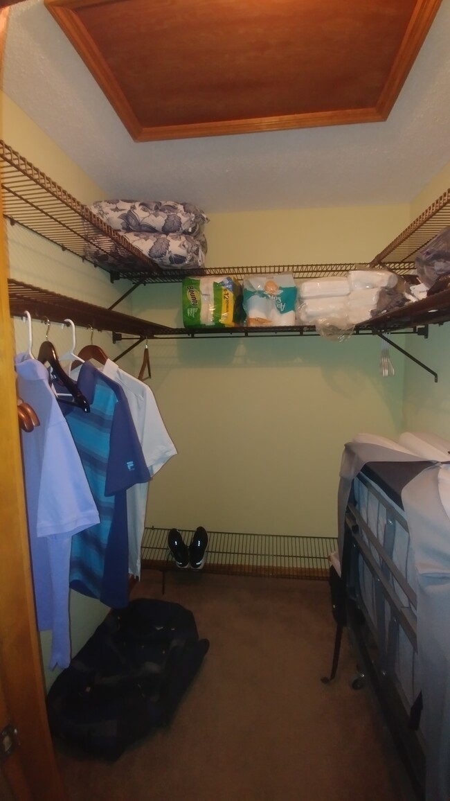 Master closet, extra roll around single bed - 47 Sea Island Dr N