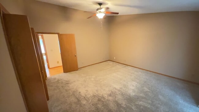 Building Photo - 4bd/3ba HUGE Home w/Hardwood Floors, Russian Fireplace, 2-Car Garage & Fenced Back Yard!