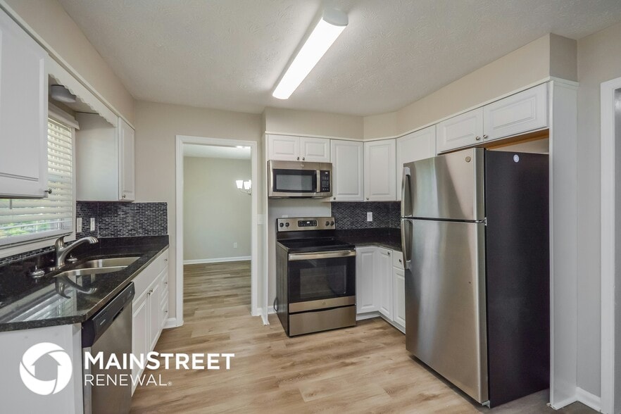 Building Photo - 6950 Carleen Ct