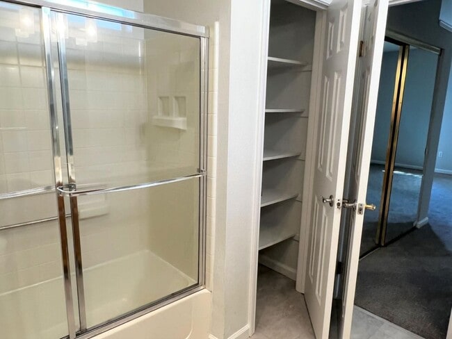 Building Photo - Spacious 2BR/2BA Redwood Shores Condo with Balcony, Natural Light & Garage Parking