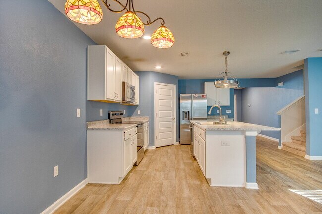 Building Photo - Season’s Savings! Spacious 5BR Near NAS – Military Half Deposit & $500 Off First Month!