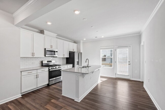 Building Photo - Bright, Spacious & Move-In Ready Townhome ...