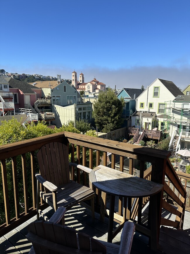 Back yard porch for access to shared back yard patio and quiet fresh air facing west - 1271 10th Ave