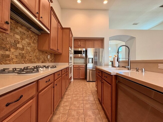 Building Photo - Beautiful 4 Bedroom with a large Pool! Located in Roseville close to a park!