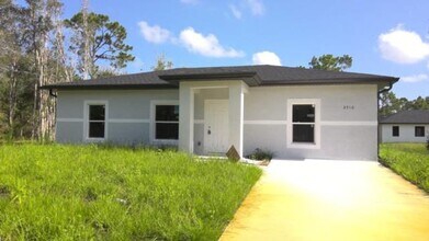 Building Photo - Brand NEW Three Bedroom/2 bath SW LEHIGH A...