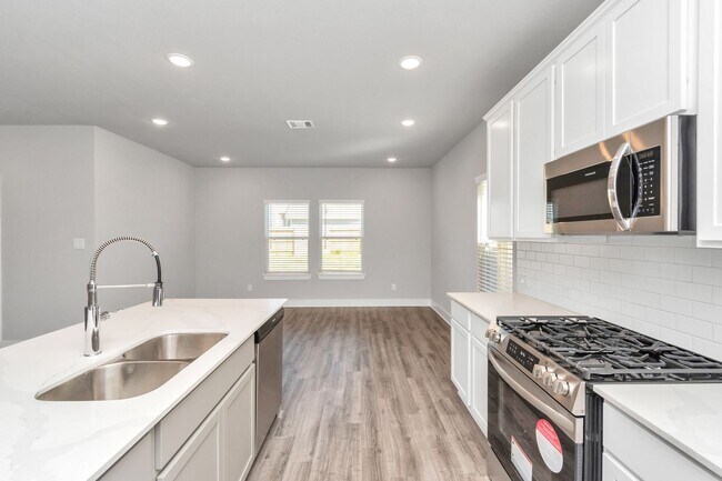 Building Photo - Welcome to the Holly — Spacious Comfort, Modern Style.