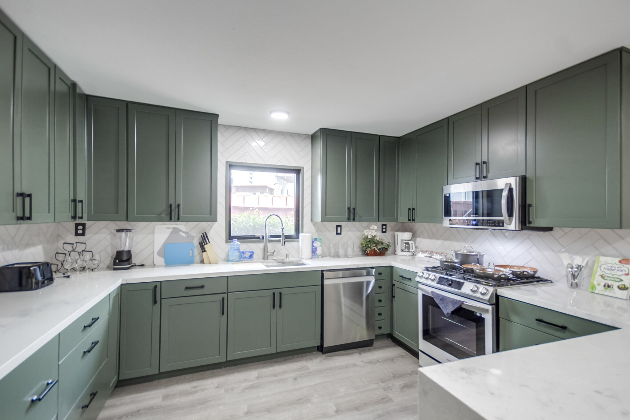 Whip up a homemade feast or grab a snack – a fully stocked kitchen has everything you need - 5551 Churchward St