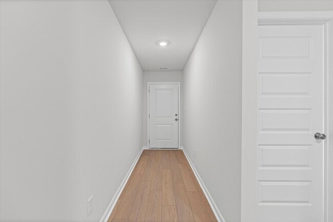 Building Photo - New 3BR Home in Whispering Woods – Modern ...