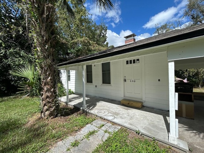 Building Photo - Freshly Painted 2x1 with Brand-New Plank Floors
