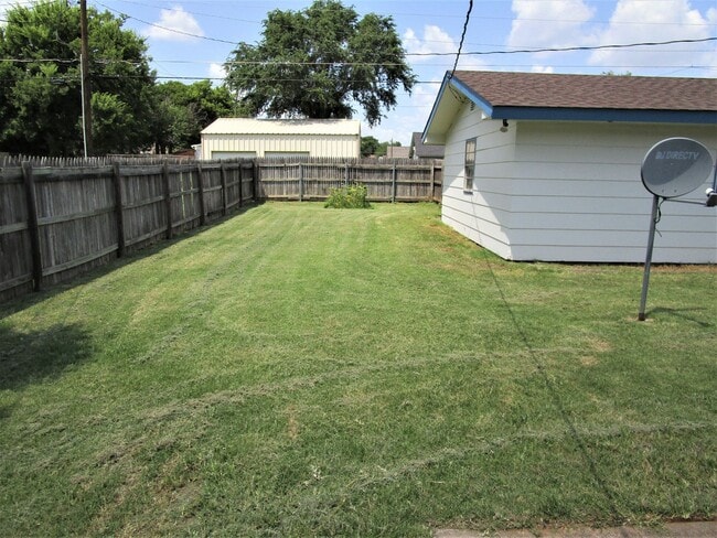 Building Photo - Covered Parking for 3 vehicles!
