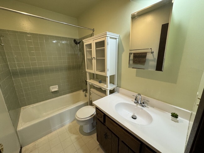 Building Photo - STOP SCROLLING — THIS TOWNHOUSE HAS IT ALL!