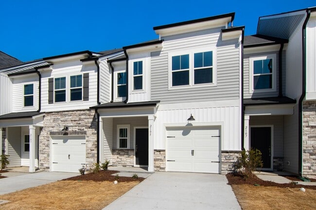 Building Photo - Luxurious 3-Bedroom Townhome Living in the...