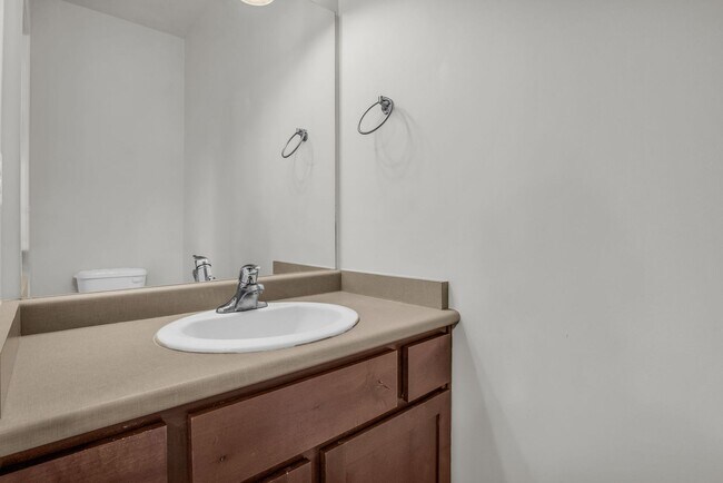 Building Photo - Spacious 4BR End-Unit Townhome | Low-Maintenance HOA Living