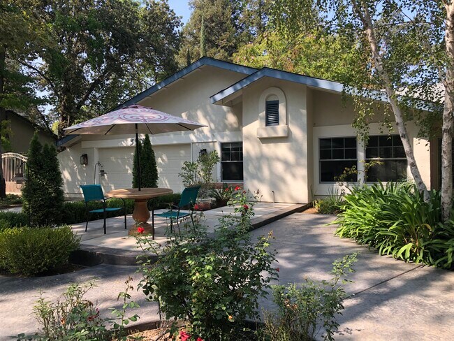 Front of house entertainment patio and mature landscaping - 5930 Long Acres Ct