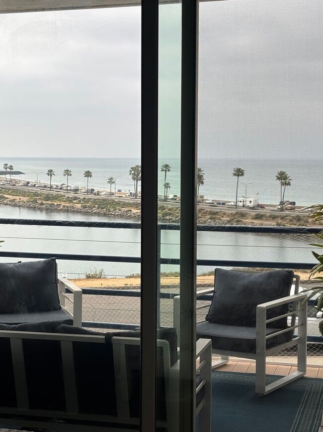 Building Photo - Enjoy unforgettable sunsets, fresh ocean air, and coastal living at its absolute best.