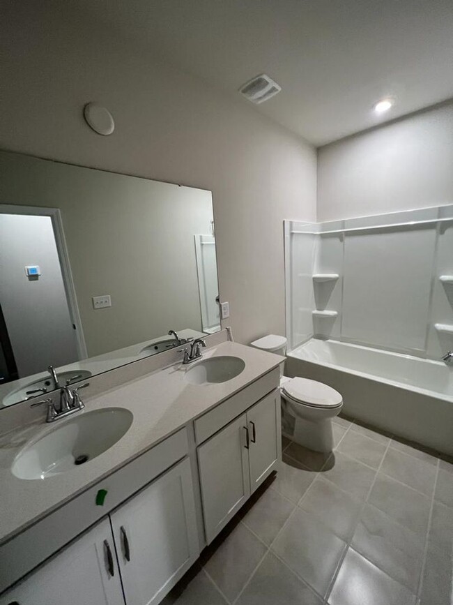 Building Photo - Townhome with 3BR/2.5BA Garage Located in ...