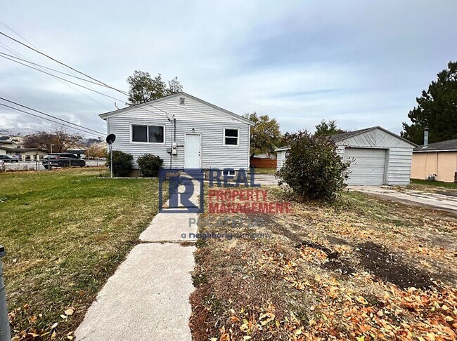 Building Photo - 4 bedroom 2 bath - 1 Car Detached Garage - Small dog negotiable