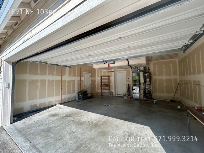 Building Photo - 1691 NE 103rd Ave