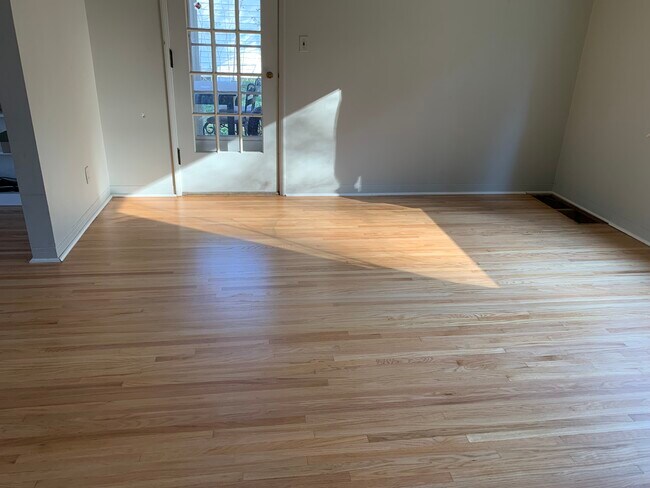Dinning room w/ hillside back view and breeze room access - 850 Hillside Dr
